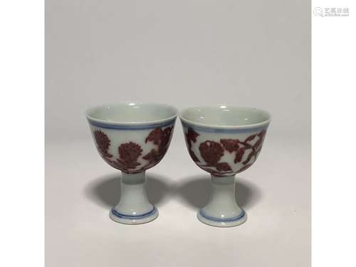 A PAIR OF COPPER-RED CUPS