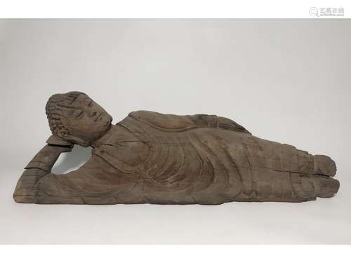 A WOODEN FIGURE OF BUDDHA