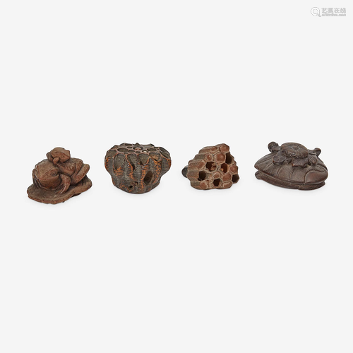 Four assorted Japanese carved wood netsuke