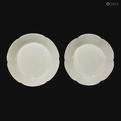 An associated pair of Chinese whiteware floriform