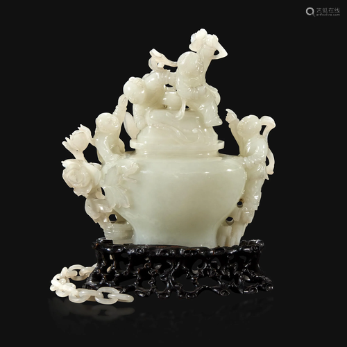 A Chinese carved white jade 