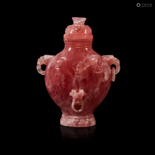 A Chinese carved rose quartz archaistic vase and cover