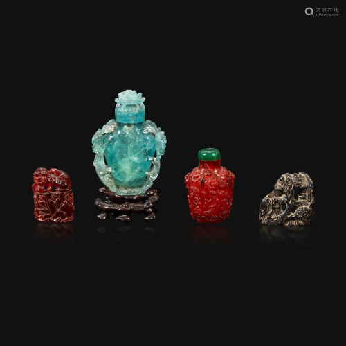 A Chinese carved aquamarine snuff bottle, an amber