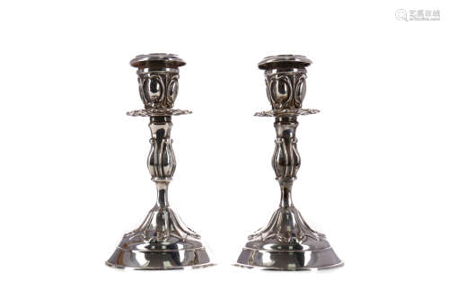 A PAIR OF CONTINENTAL ARTS & CRAFTS SILVER CANDLESTICKS