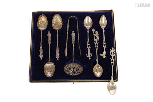 A CASED COMPOSITE SET OF APOSTLE SPOONS AND TONGS