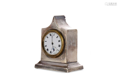 AN EARLY 20TH CENTURY SILVER CASED BEDSIDE TIMEPIECE