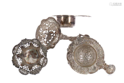 A LOT OF THREE SILVER TEA STRAINERS, AND A BONBON DISH