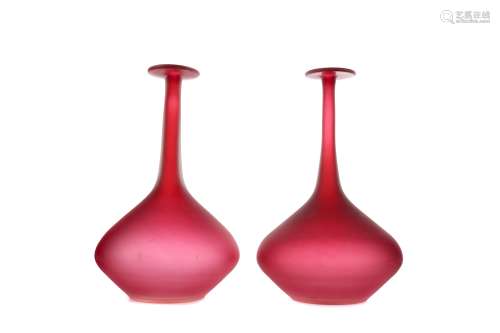 A PAIR OF RED SATIN GLASS VASES
