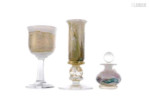 A CONTEMPORARY GLASS CANDLESTICK, ALONG WITH A WINE GLASS AN...