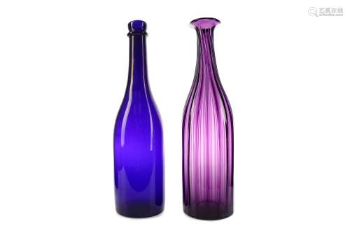 A WILLIAM IV AMETHYST GLASS DECANTER