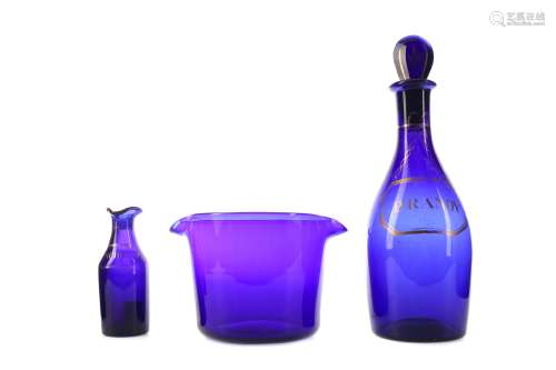 AN EARLY 19TH CENTURY BRISTOL BLUE GLASS DECANTER AND STOPPE...