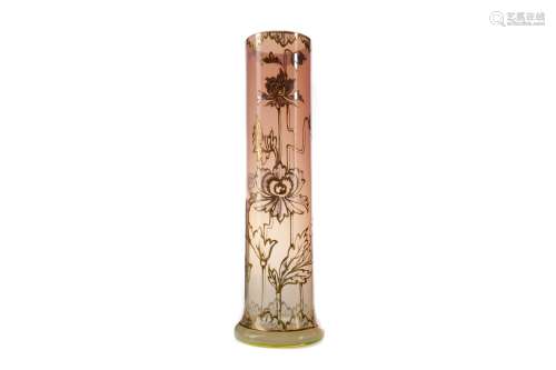 A LATE 19TH CENTURY VASELINE GLASS SPILL VASE