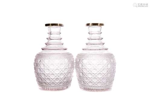 A PAIR OF SILVER MOUNTED REGENCY CUT GLASS MAGNUM DECANTERS