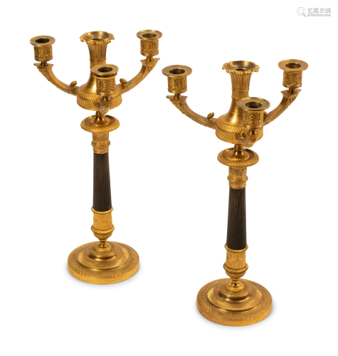 A Pair of Empire Style Gilt and Patinated Bronze