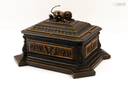 An Austrian Carved and Ebonized Wood Table Casket with