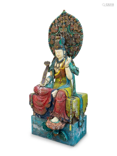 A Large Polychromed Wood Figure of Seated Guanyin