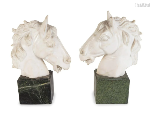 A Pair of Continental Carved Marble Horse Heads