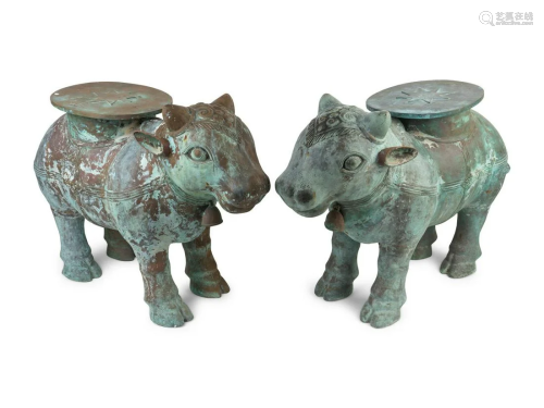 A Pair of Indian Sacred Cow-Form Metal Garden Seats