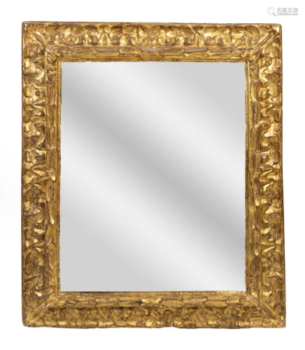 An Italian Baroque Giltwood Mirror