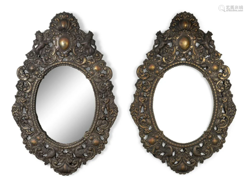 A Pair of Baroque Style Repouseed Brass Mirrors
