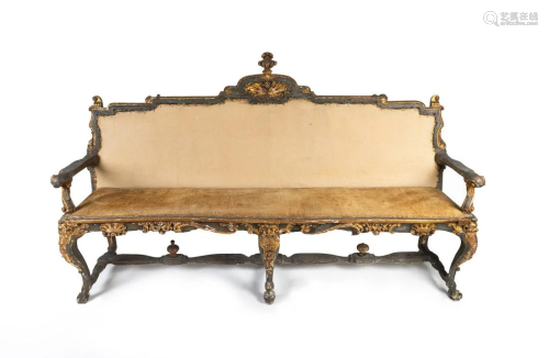 An Italian Early Rococo Parcel-Gilt and Painted Settee