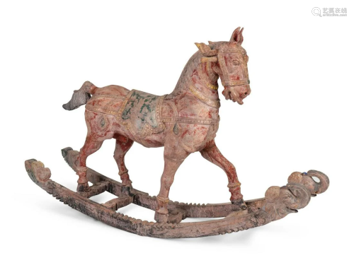 An Indian Polychromed and Carved Wood Rocking Horse