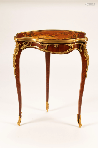 A Louis XV Style Marquetry Cartouche Table