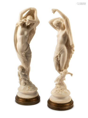 A Pair of Italian Marble Figures of Ladies with Cherubs