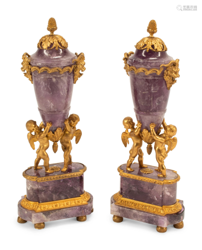 A Pair of French Gilt Bronze and Amethyst Figural Urns