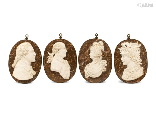 A Set of Four Iron-Framed Marble Portrait Medallions