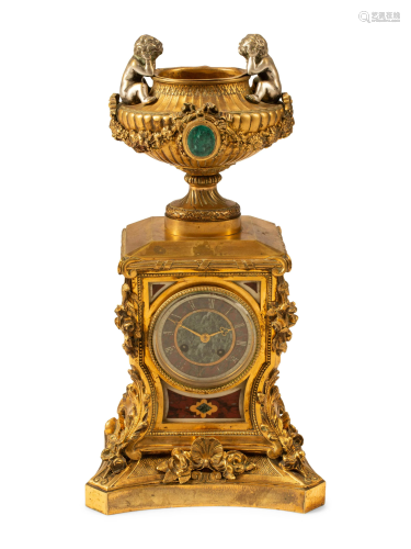 A French Gilt Bronze and Specimen Marble Clock