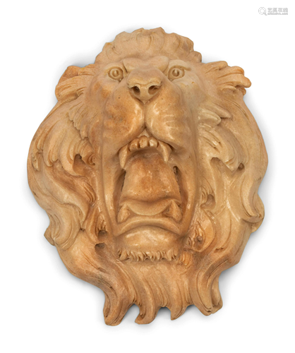 A Continental Carved Marble Lion Mask