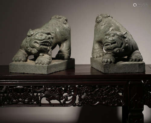 PAIR OF BLUE STONE LION FORMED ORNAMENTS