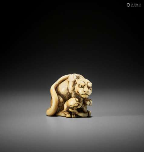 TOMOTADA: AN EXCEPTIONAL IVORY NETSUKE OF A TIGRESS AND CUB