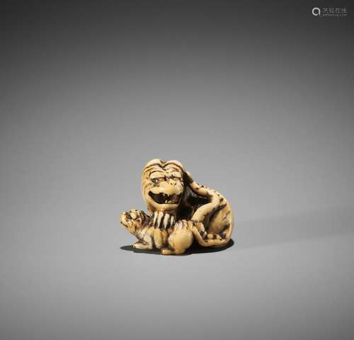 HAKURYU I: A SUPERB IVORY NETSUKE OF A TIGER AND CUB