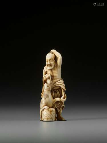 AN EXCEPTIONAL IVORY NETSUKE OF A SENNIN WITH DOG ATTRIBUTED...