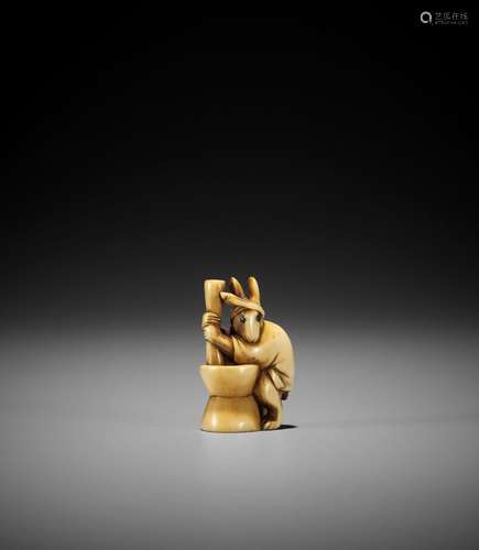 KOGYOKU: AN OSAKA SCHOOL IVORY NETSUKE OF A LUNAR HARE POUND...