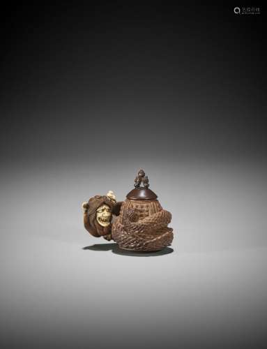 AN INLAID WOOD NETSUKE OF KIYOHIME, ATTRIBUTED TO MINKO