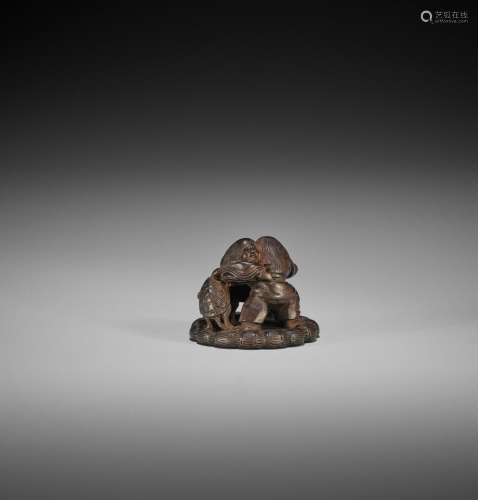 HEIZO: A DARK WOOD NETSUKE OF TWO SHOJO WRESTLING AND TORTOI...