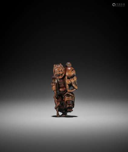 A WOOD NETSUKE OF YAMA-UBA AND KINTARO