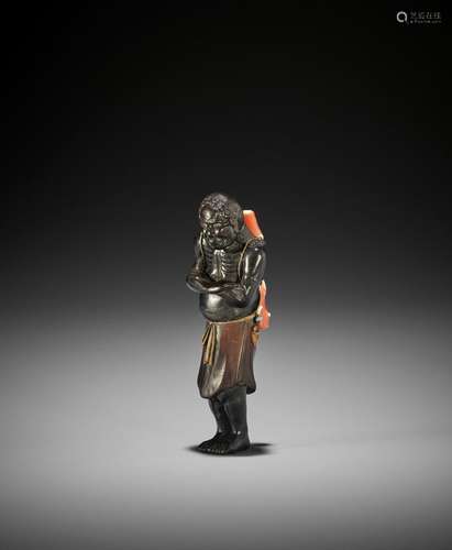 SHIBAYAMA SOICHI: A FINE INLAID EBONY WOOD NETSUKE OF A CORA...