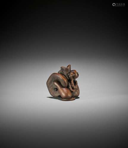 DERKACHENKO: A BOXWOOD NETSUKE OF A KINCHAKU, NETSUKE AND OJ...