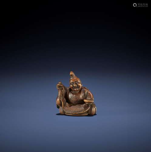 ISHIKAWA RENSAI: A FINE WOOD NETSUKE OF EBISU