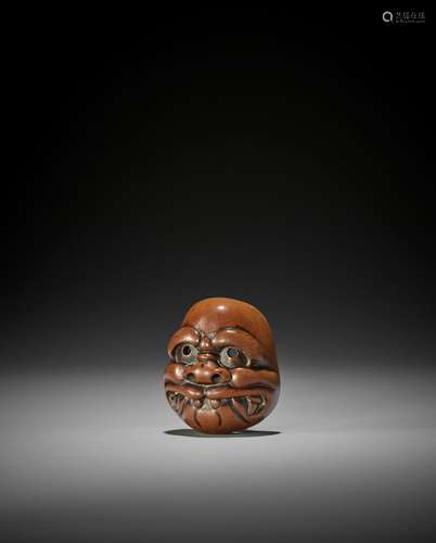 SHOZAN: A WOOD KYOGEN MASK NETSUKE OF BUAKU