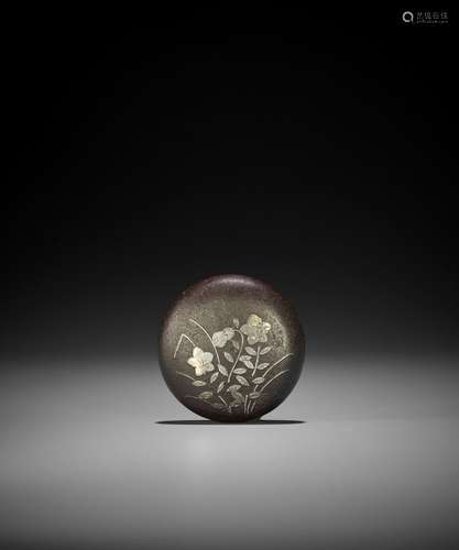 A RARE SILVER-INLAID IRON MANJU NETSUKE