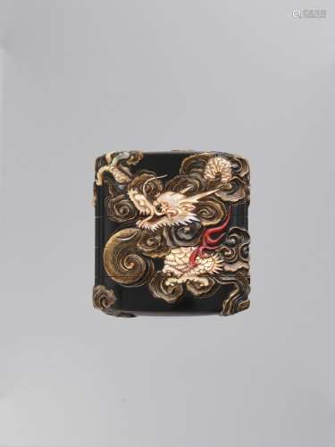 AN INLAID LACQUER FOUR-CASE INRO DEPICTING A DRAGON