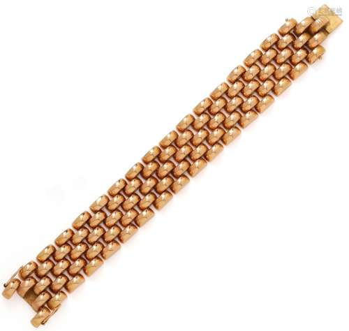 Bracelet ruban en or jaune 18K (750/1000) composée de larges...