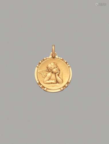 Médaille en or jaune 18K (750/1000) figurant un angelot.Trac...