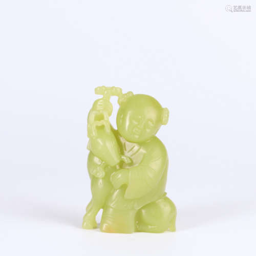 A YELLOW HETIAN JADE CARVED BOY ORNAMENT