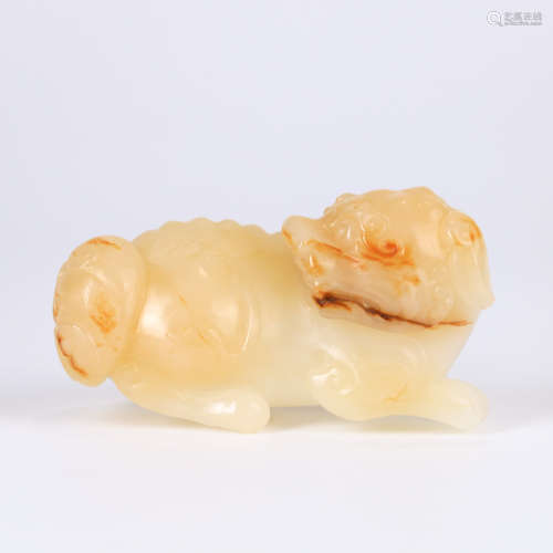 A HETIAN JADE CARVED LUCKY BEAST ORNAMENT